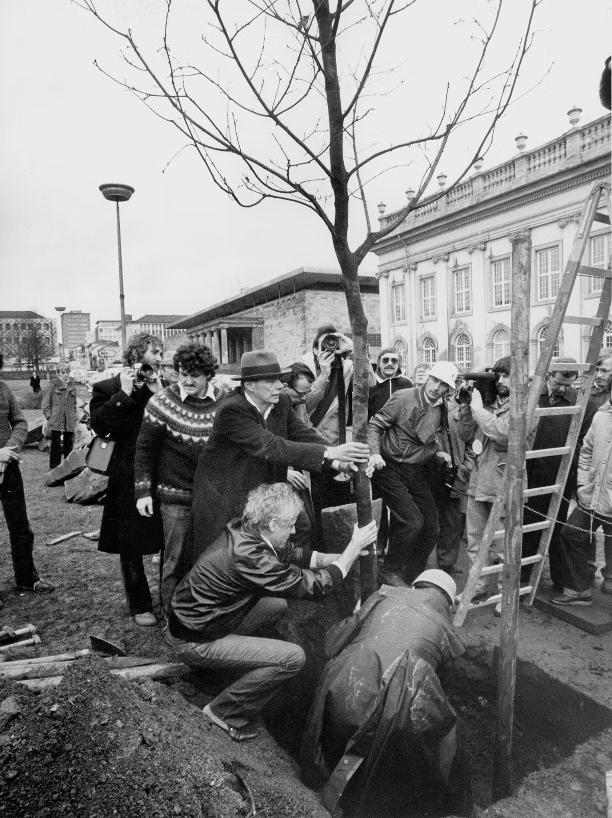 Joseph Beuys plants an oak at Documenta 7, Kassel, June 1982 