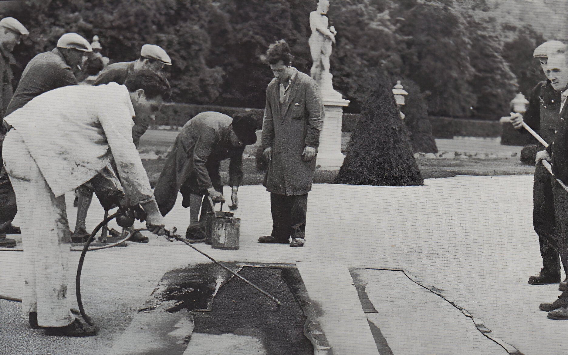 Last Year at Marienbad (1961), production still [showing the painting of shadows utilising stencils in the Nymphenburg Palace garden].