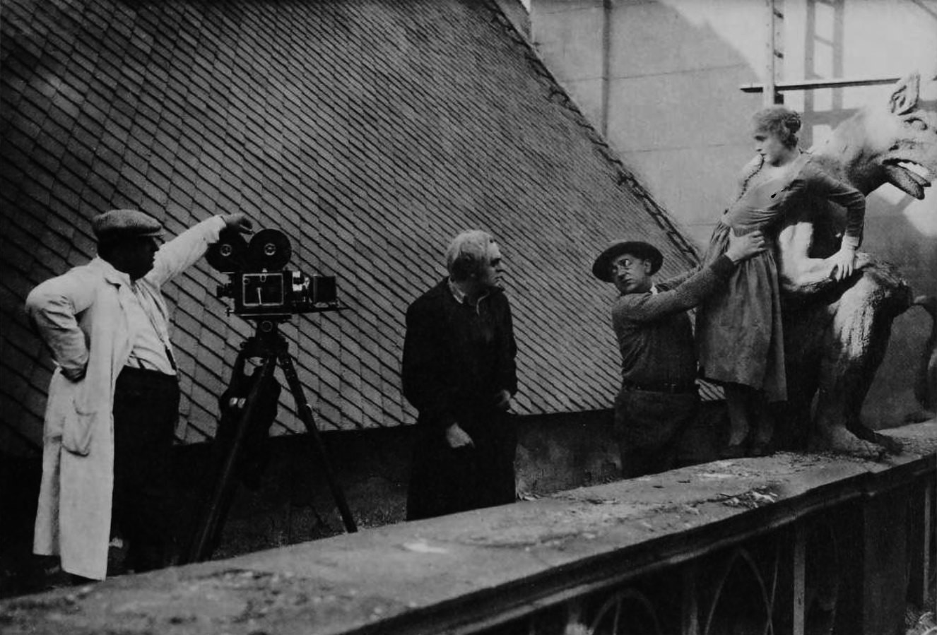 Fritz Lang directing the chase over the cathedral roof scene, 1926.