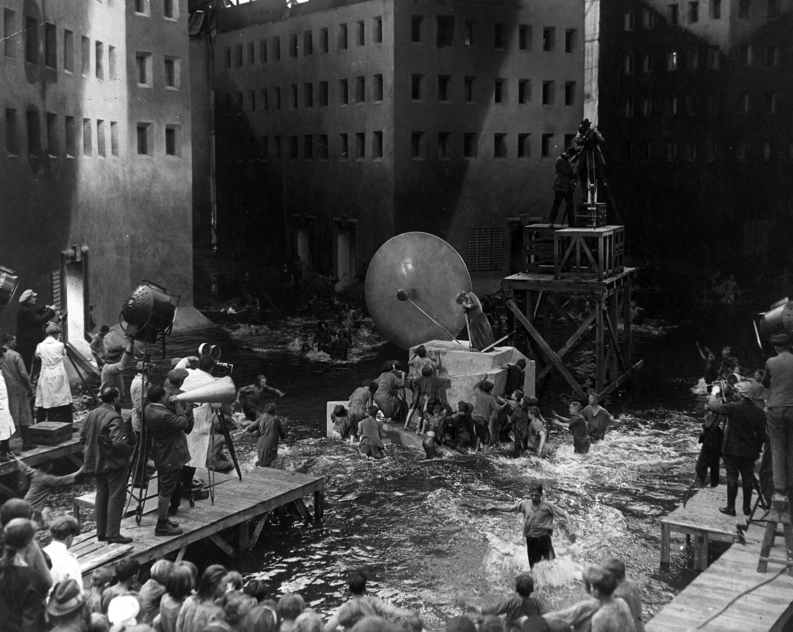 Metropolis (1927), During shooting of the flood, Fritz Lang with megaphone, production still. 