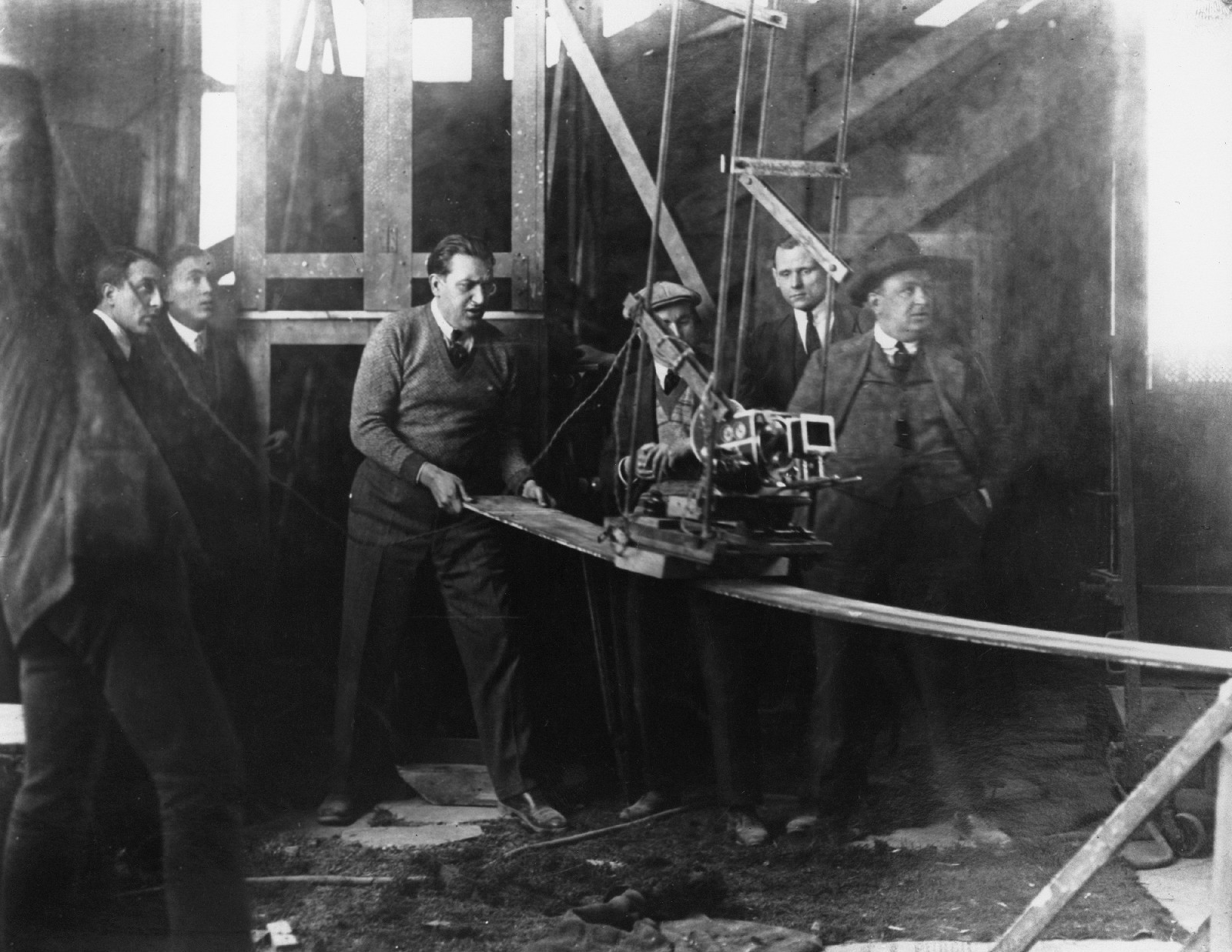 Metropolis (1927), Fritz Lang (by the Stachow camera mounted on a swing), production still. 